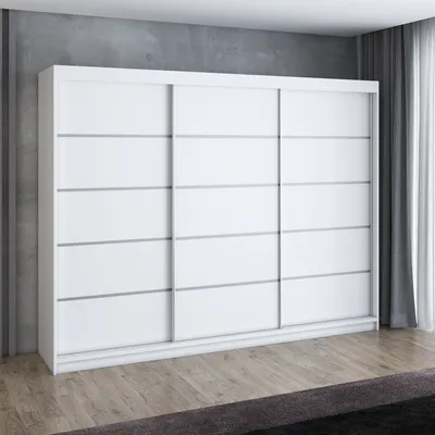 A white sliding door wardrobe is shown in a room with a concrete wall and wooden floor.