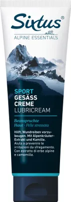 A tube of Sixtus Sport Gesäß Creme with a mountain landscape image.