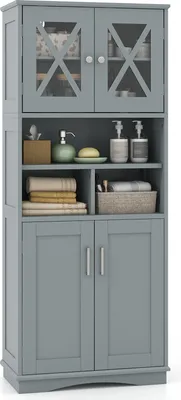 A gray freestanding storage cabinet with glass doors on top and solid doors on the bottom, filled with various bathroom items.