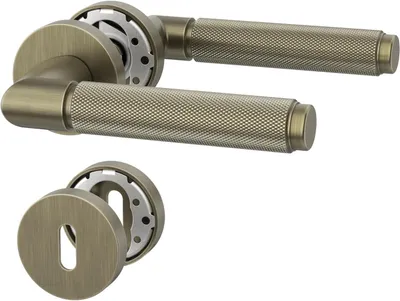 Immagine prodotto di Set di maniglie per porte interne, finitura in ottone anticato spazzolato, rosetta da 38 mm