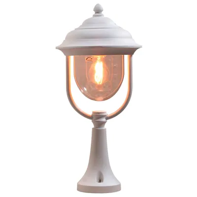 A white outdoor lamp with a clear glass enclosure and an illuminated bulb.