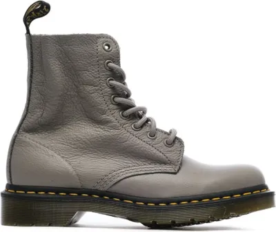 A single gray Dr. Martens boot is shown against a white background.
