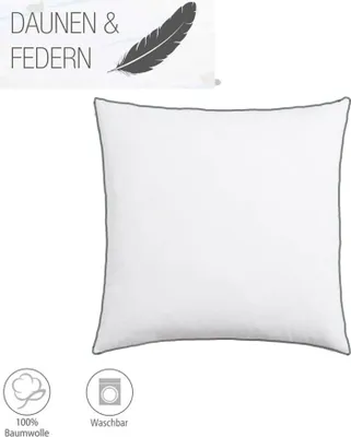 A white pillow with gray piping is shown against a white background. Text and icons are present in the upper left and lower left corners.