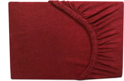 A close-up view of a burgundy fitted sheet, showing the elasticized corner.