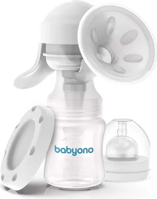 A white manual breast pump with a bottle and accessories on a white background.