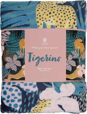 A folded blanket with a tropical print featuring leopards and flowers, presented with its packaging.