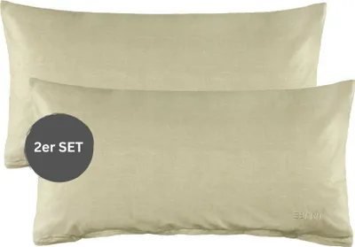 Two beige pillowcases are stacked on top of each other.