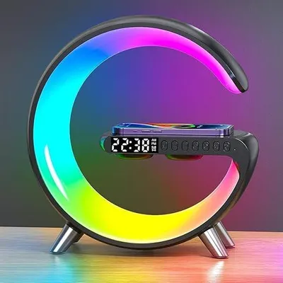 A modern, 'G' shaped LED lamp with a built-in wireless charger and digital clock, displaying a colorful gradient light.