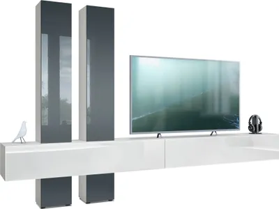 A modern TV stand with two tall cabinets and a TV on top, against a white background.