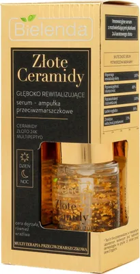 The image shows the retail packaging of a skincare product, specifically a serum in a glass jar with gold flakes inside.