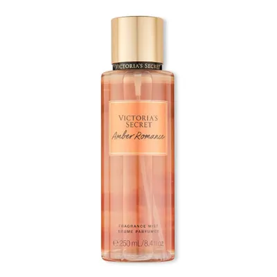 A bottle of Victoria's Secret Amber Romance fragrance mist.
