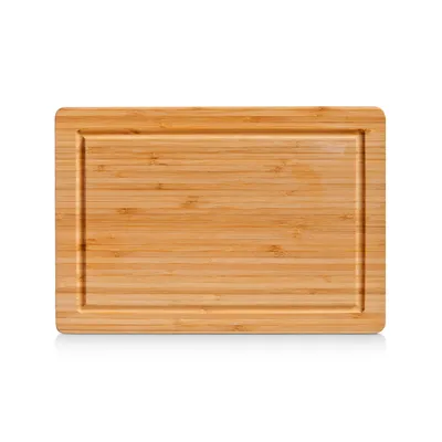 A rectangular bamboo cutting board with a subtle groove around the edge, presented on a white background.