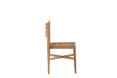 A side view of a wooden chair against a white background.