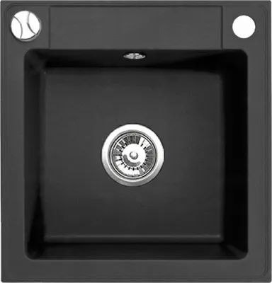 A top-down view of a black kitchen sink.