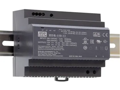 A gray industrial power supply unit mounted on a DIN rail.