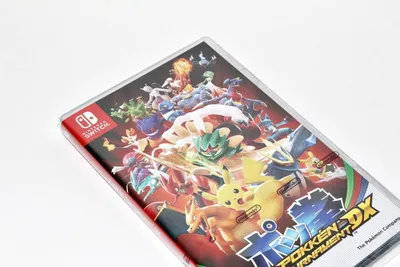 A Nintendo Switch game case for Pokken Tournament Dx is shown at an angle on a white background.