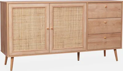 A light wood sideboard with two rattan-fronted doors and three drawers, shown against a white background.