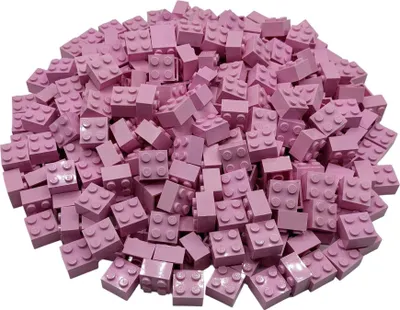 A pile of pink LEGO bricks.