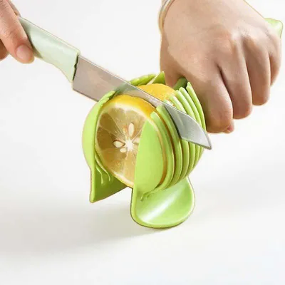 Produktbild von Multifunktionaler Obstschneider - Spültopfsicherer Kunststoff & ergonomischer Griff für Zitrusfrüchte