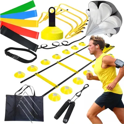 A collection of soccer training equipment arranged on a white background, with a runner in the midground.