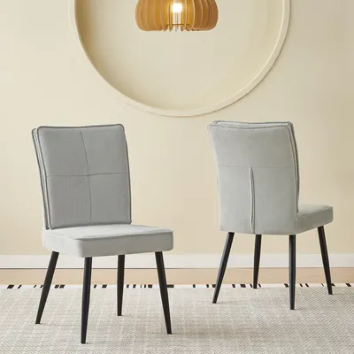 Productafbeelding van Set van 2 eetkamerstoelen, met metalen poten, bekleed met lichtgrijze veloursstof met een haantjesmotief.