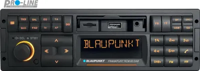 A Blaupunkt car radio with a digital display and numerous buttons.