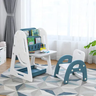 A children's desk and chair set with a bookshelf, placed on a rug in a room with natural light.