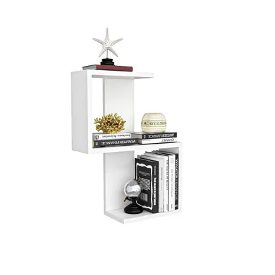 A white modular shelf unit with books and decorative items.