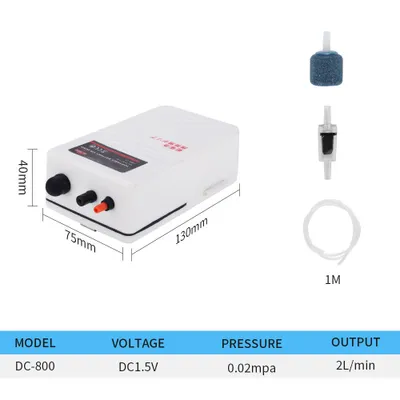 A white aquarium air pump with its accessories and a specification table.