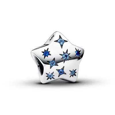 A silver star-shaped charm with blue gemstones, set against a white background.