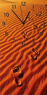 Produktbild von Wallario Design Wanduhr bedruckt, Größe 30 x 60 cm, Motiv: Fußspuren im Sand - Sanddüne in der Wüste