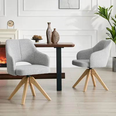Immagine prodotto di Set di 2 poltrone girevoli in stile retrò. Sedie da pranzo in tessuto color grigio chiaro con gambe in legno massello. Girevoli a 360 gradi, ideali per il soggiorno