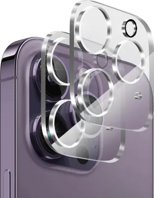 A close-up, angled view of a phone camera lens protector being applied to a purple smartphone.