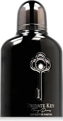 A close-up studio shot of a black perfume bottle with a silver key emblem.