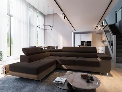 A modern living room with a large sectional sofa, dining area, and staircase.