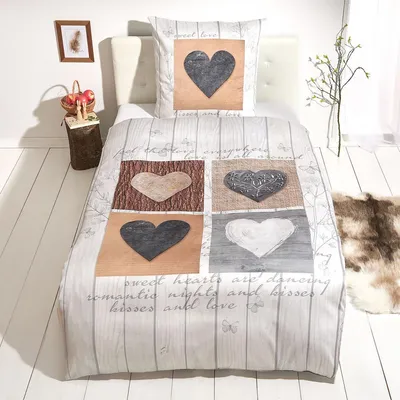 Produktbild von Traumschlaf Mako-Satin Bettwäsche Herzenssache 155x220 cm + 80x80 cm