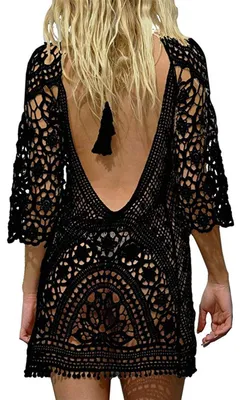 Imagen del producto de Vestido de playa de corte holgado y oversize, ideal como prenda para cubrir el traje de baño, perfecto para el verano, la playa y la piscina. Fabricado con encaje de crochet suave