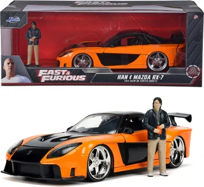 Produktbild von Jada – Mazda RX7 Metallisches Fahrzeug, Druckguss. Aus der Fast & Furious-Saga (offizielle Lizenz) mit Han-Figur, beweglichen Teilen. Maßstab 1:24. (253205002)