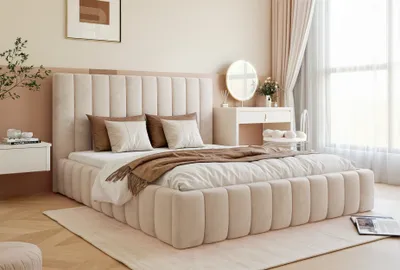 A bedroom scene with a bed, vanity, and window.