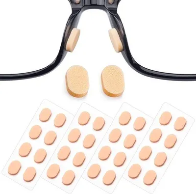 Productafbeelding van 16 paar - Universele skussentjes voor brillen - Zelfklevend - Brilpads - svleugels - Sponsspads - Zachte schuimspads - 1,5 mm - Beige