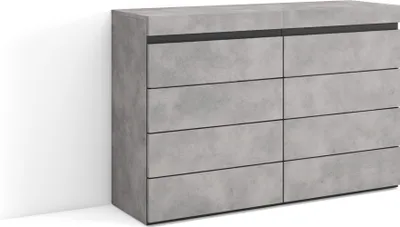 A gray dresser with six drawers against a white wall.