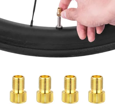 Zdjęcie produktu dla Adaptery do zaworów - zestaw 4 sztuki - kompatybilne z zaworami Presta, Schrader i Dunlop
