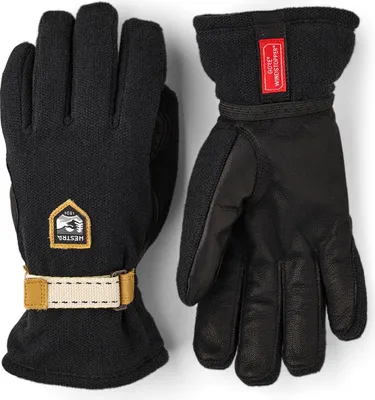 Schwarze Skihandschuhe "Windstopper Tour - 5 finger" von Hestra mit Leder- und Stoffelementen.