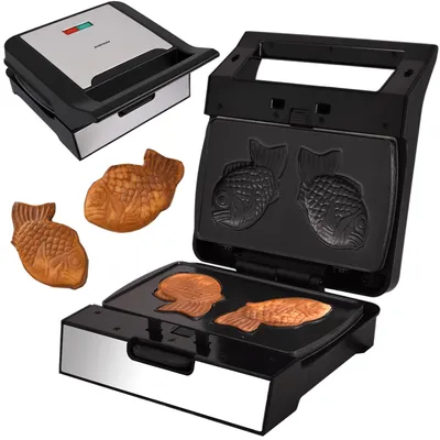 A taiyaki maker and finished taiyaki cakes.