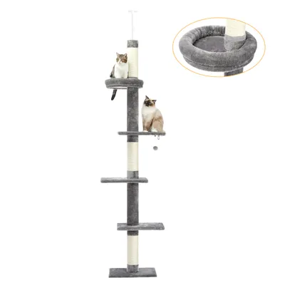 A tall, multi-tiered cat tree with two cats on it, set against a white background. A close-up inset shows a detail of the cat tree's sleeping basket.