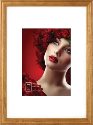 A framed picture of a woman with a floral headdress.