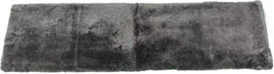 A rectangular rug or blanket made of sheepskin.
