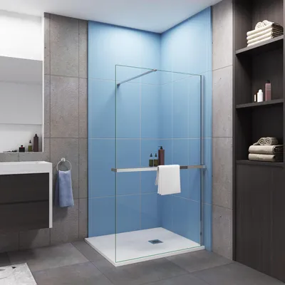 A modern bathroom with a walk-in shower, vanity, and shelving unit.