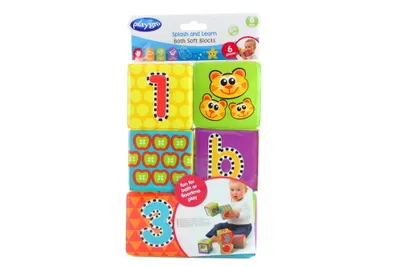 A package of six soft blocks for babies, featuring numbers and animal faces.