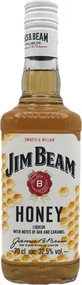 A bottle of Jim Beam Honey liqueur against a white background.
